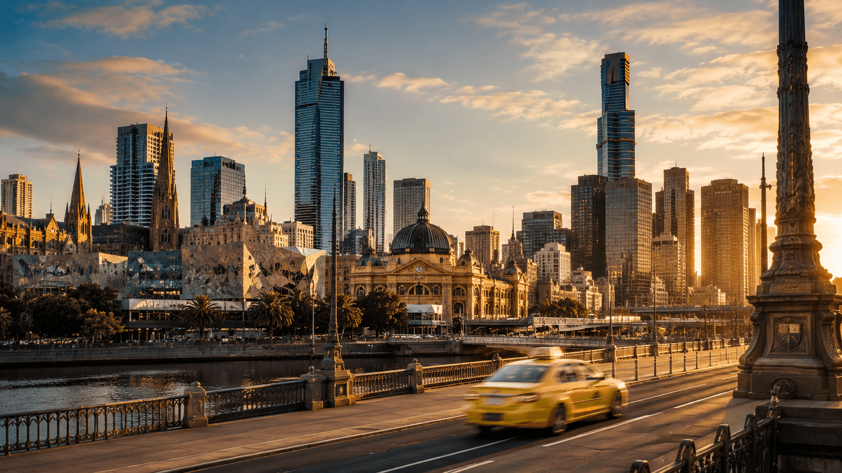 Melbourne city skyline at dusk with taxi on Princes Bridge